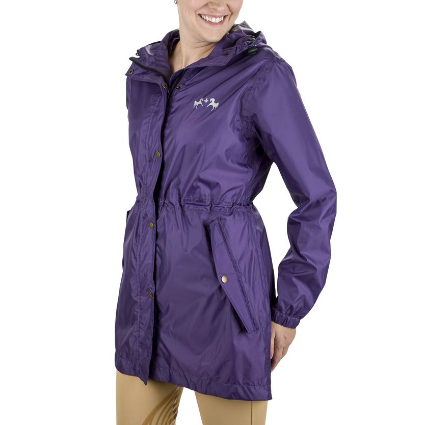 Purple raincoat worn by a person on a white background