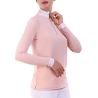Pink long-sleeve top with white trim on a white background