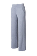 Person wearing light gray wide-leg pants on a white background