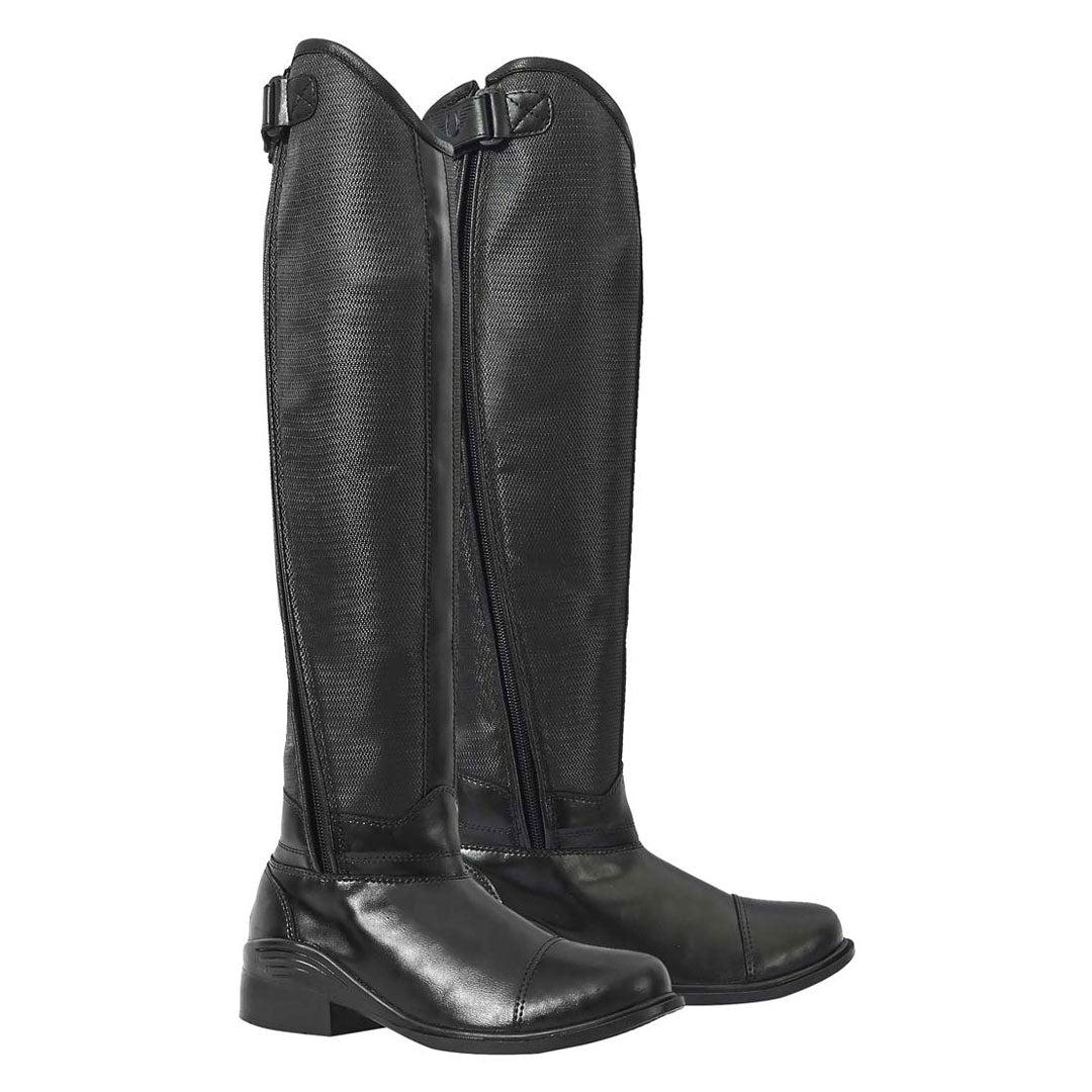 Pair of black riding boots on a white background