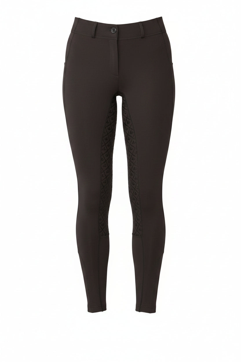 Black riding pants worn by a person on a white background