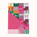 Pink scarf with colorful patterned squares in the background