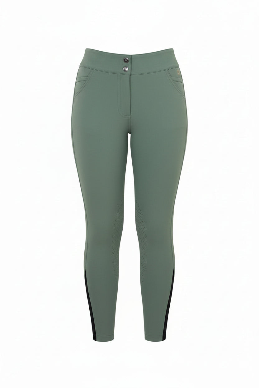 Green riding pants with a pink belt on a gray background