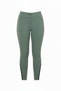 Green riding pants with a pink belt on a gray background
