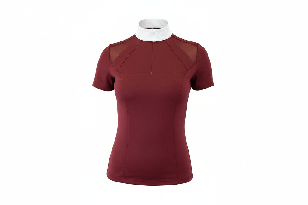 maroon top with a white collar and beige pants on a white background