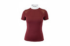 maroon top with a white collar and beige pants on a white background