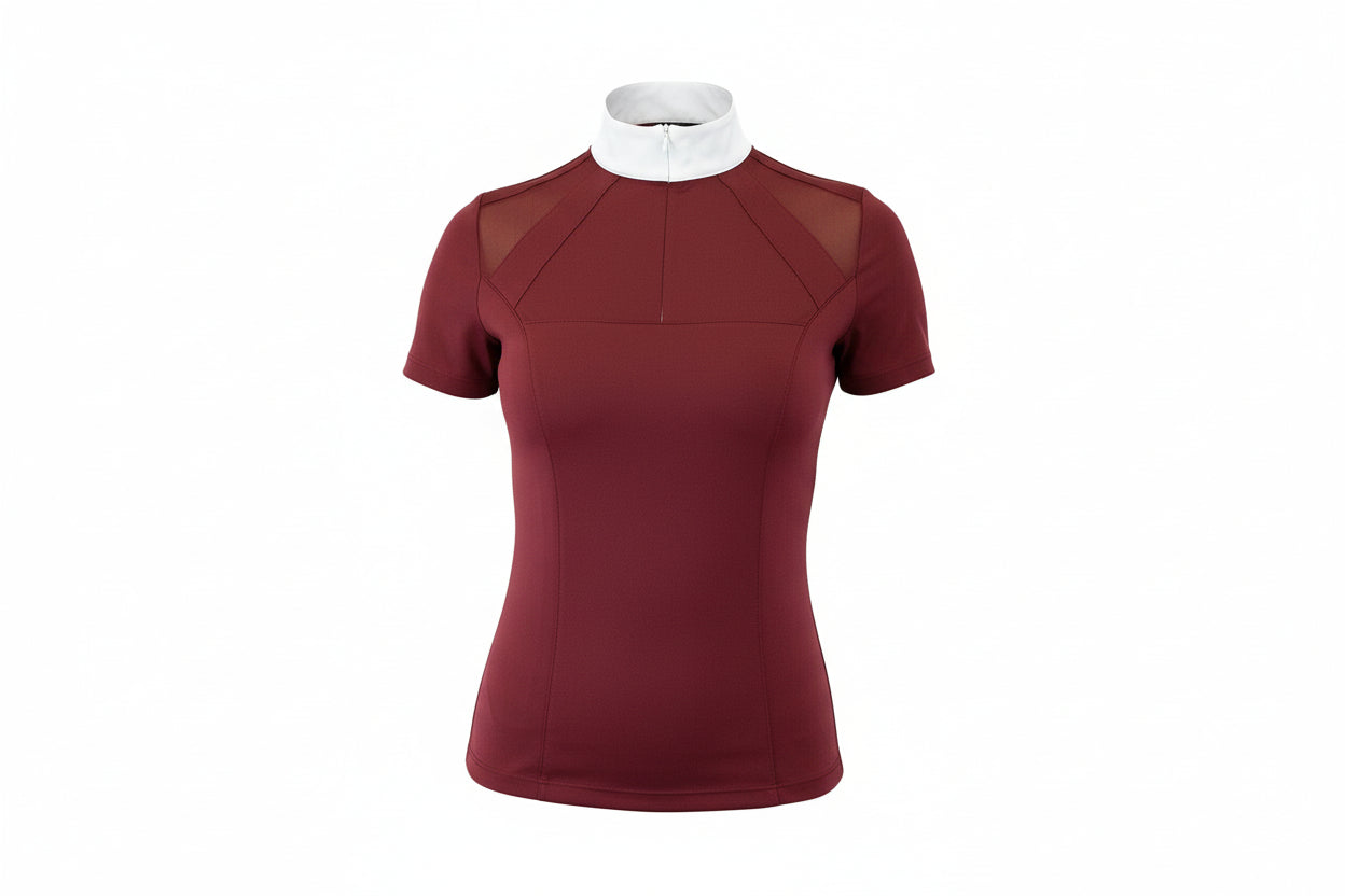 maroon top with a white collar and beige pants on a white background