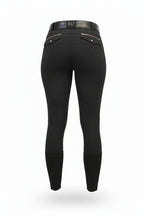 Black riding pants with a patterned design on a white background