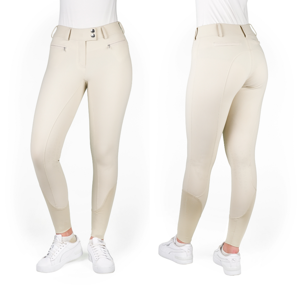 Beige riding pants worn by a person on a white background