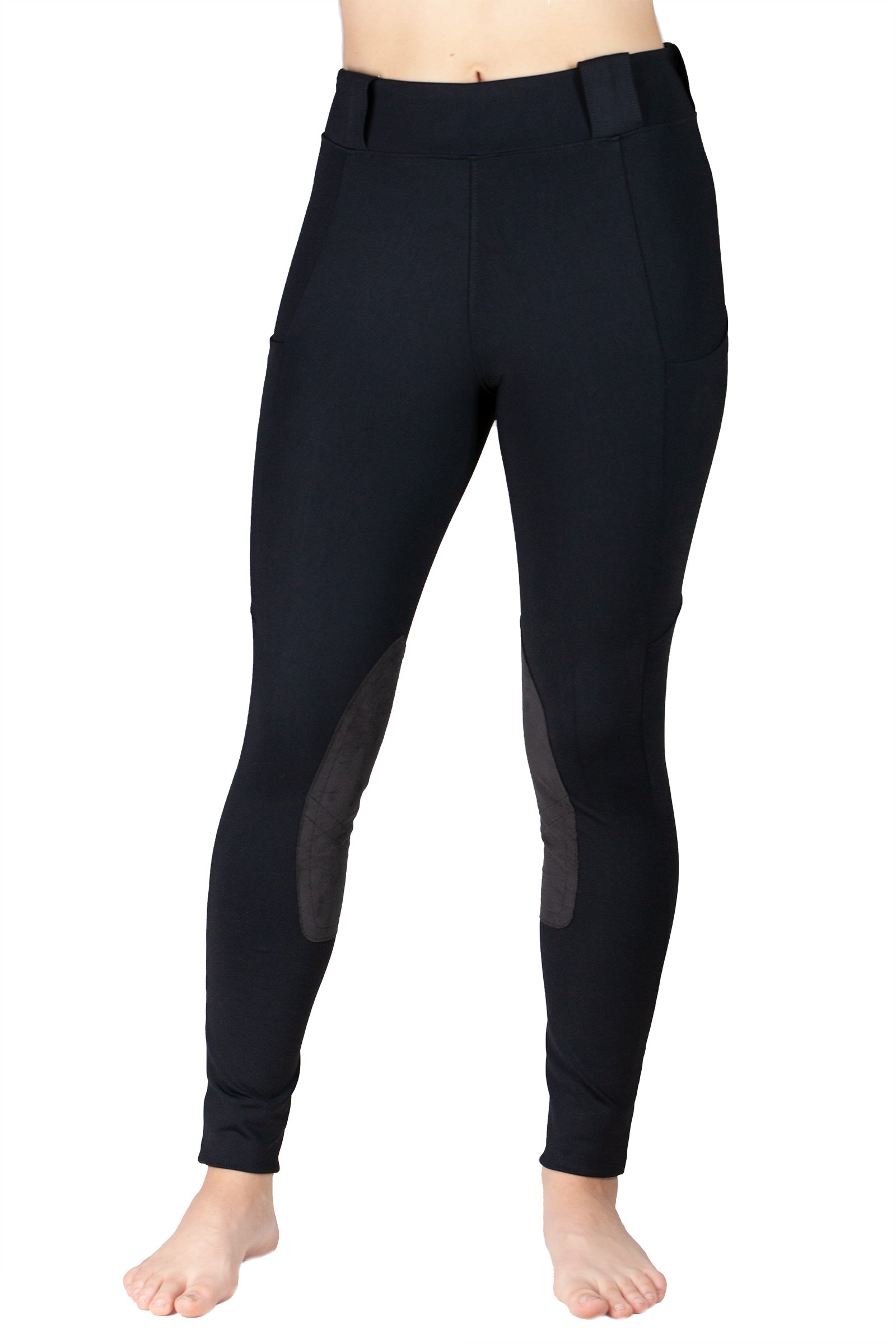 Black riding pants on a white background