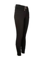 Black riding pants on a beige background