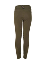 Green riding pants on a beige background