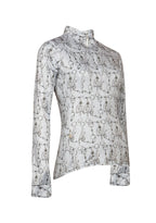 Patterned blouse on a light gray background
