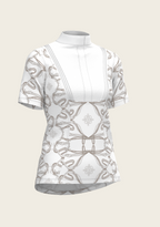 White blouse with geometric pattern on a light beige background
