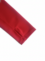 Red sleeve with thumb hole on a white background