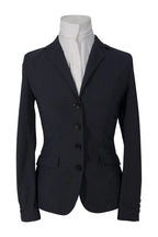 Black blazer on a mannequin with a white shirt underneath against a white background