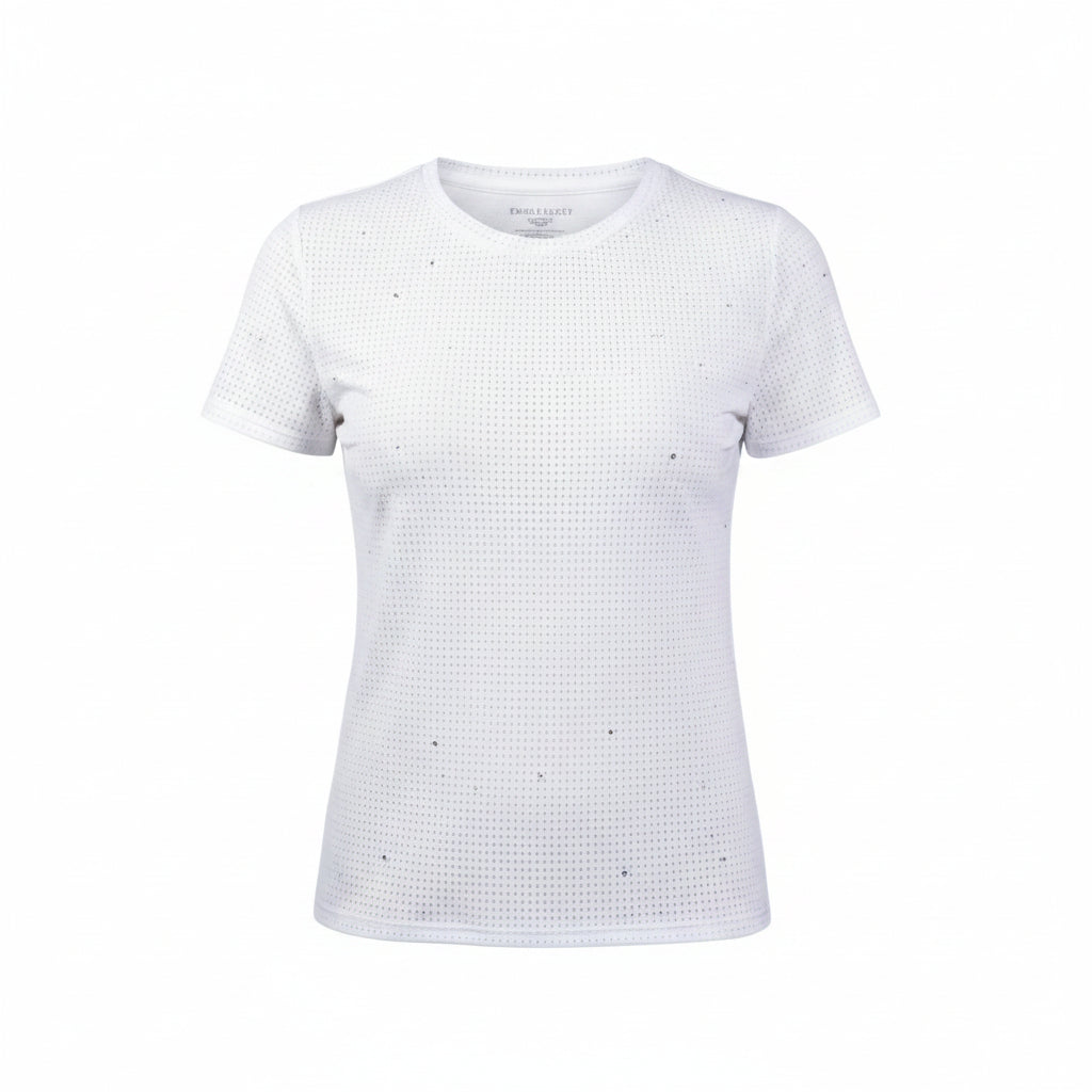 Woman wearing a white textured t-shirt and beige pants on a white background