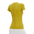 Woman wearing a yellow athletic shirt on a white background