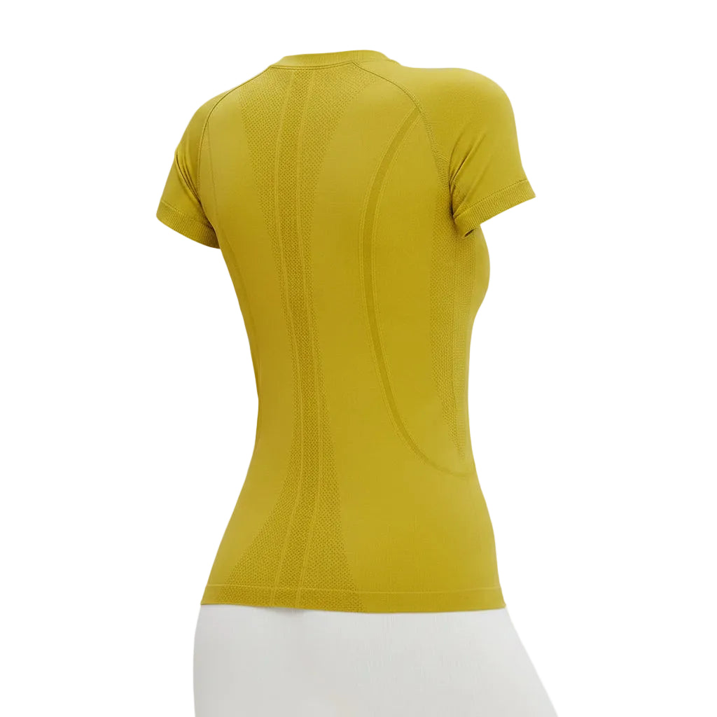 Woman wearing a yellow athletic shirt on a white background