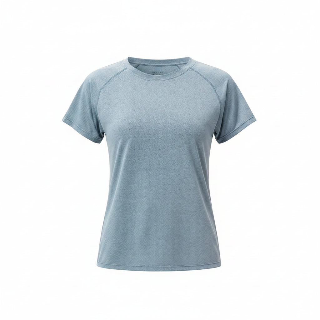 Woman wearing a light blue athletic shirt on a white background