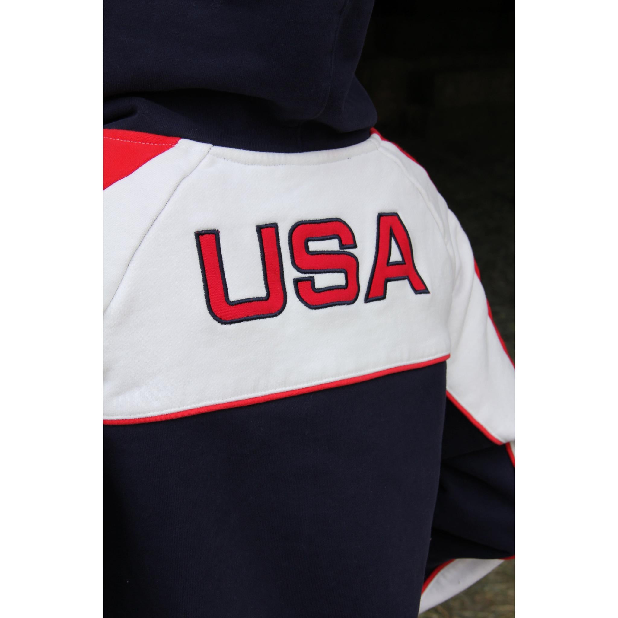 Close-up of a sports jersey with 'USA' text on a dark background