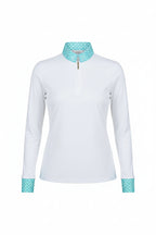 light blue shirt with white sleeves and beige pants against a gray background