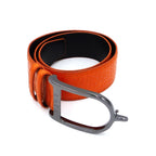 Orange belt with silver buckle on a white background