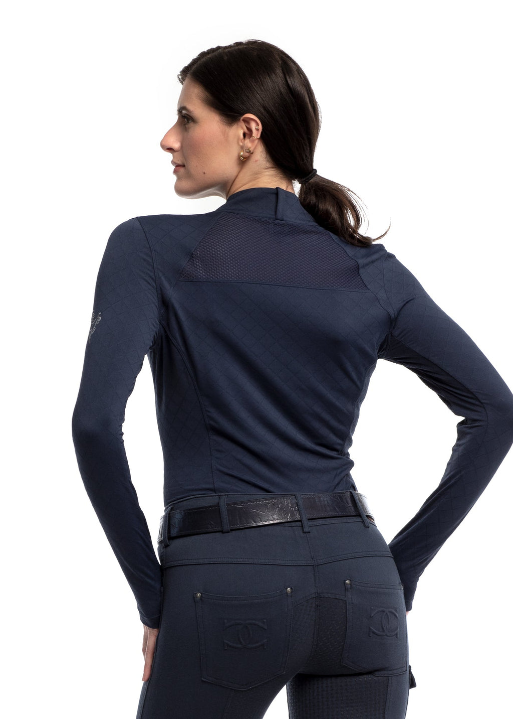 Person wearing a navy blue long-sleeve shirt and pants on a white background