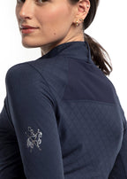 Navy blue jacket with a brand logo on the back, worn by a person.