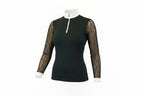 black long-sleeve top with sheer sleeves and white pants on a white background