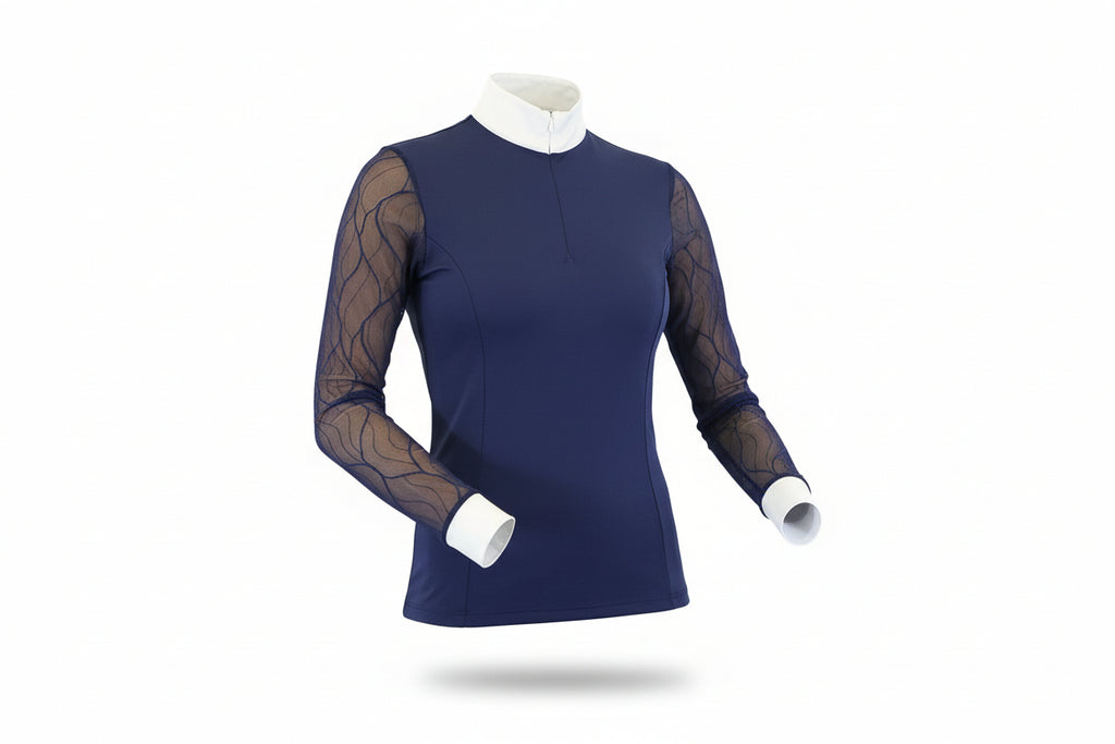 navy blue top with sheer sleeves and white pants on a white background