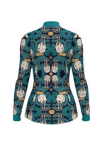 Teal shirt with horse pattern on a beige background