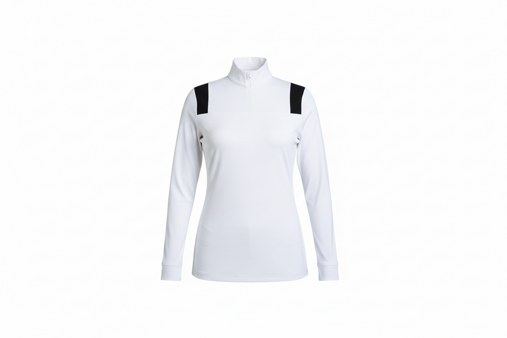  white long-sleeve shirt with black suspenders against a blurred indoor background