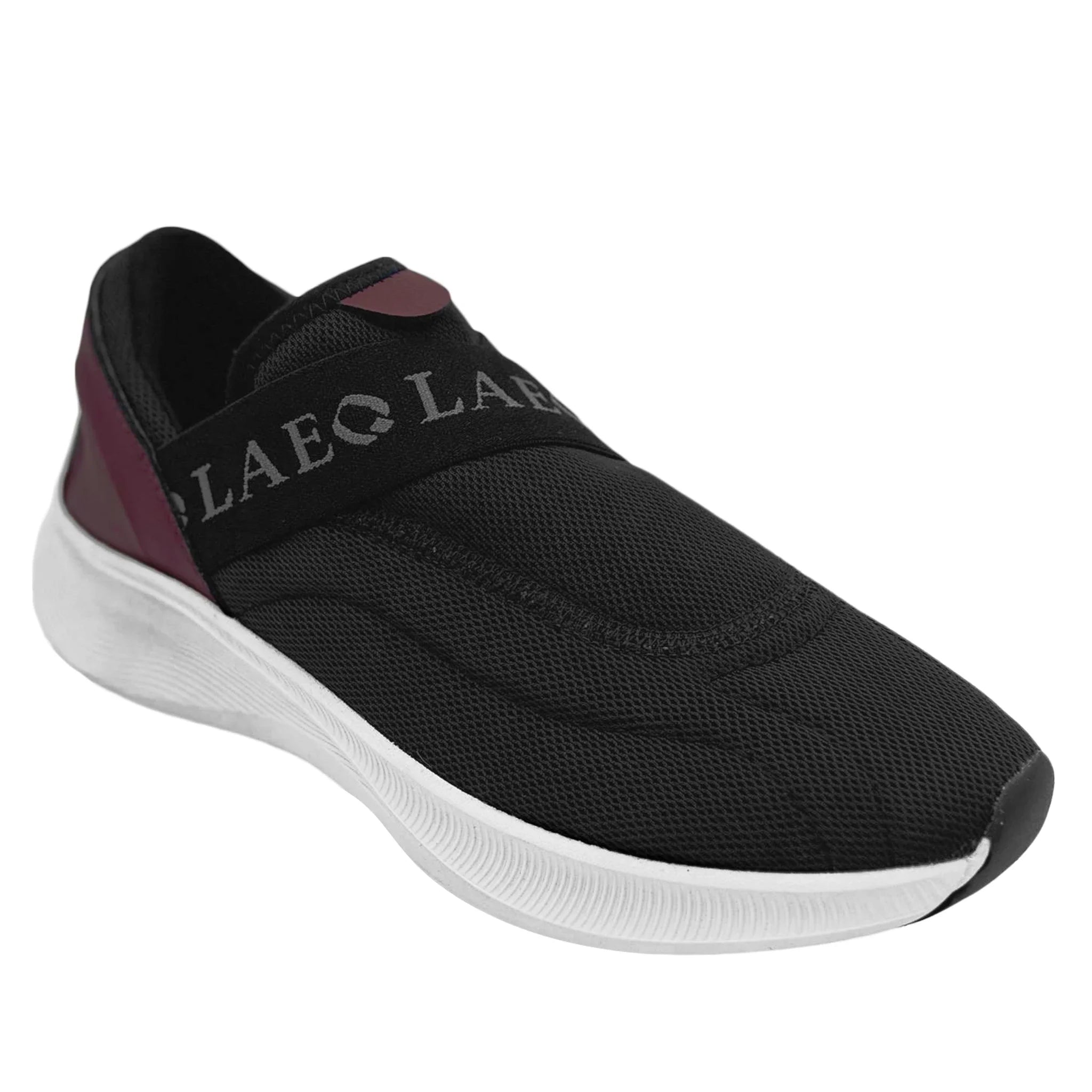 Black slip-on sneaker with white sole on a white background