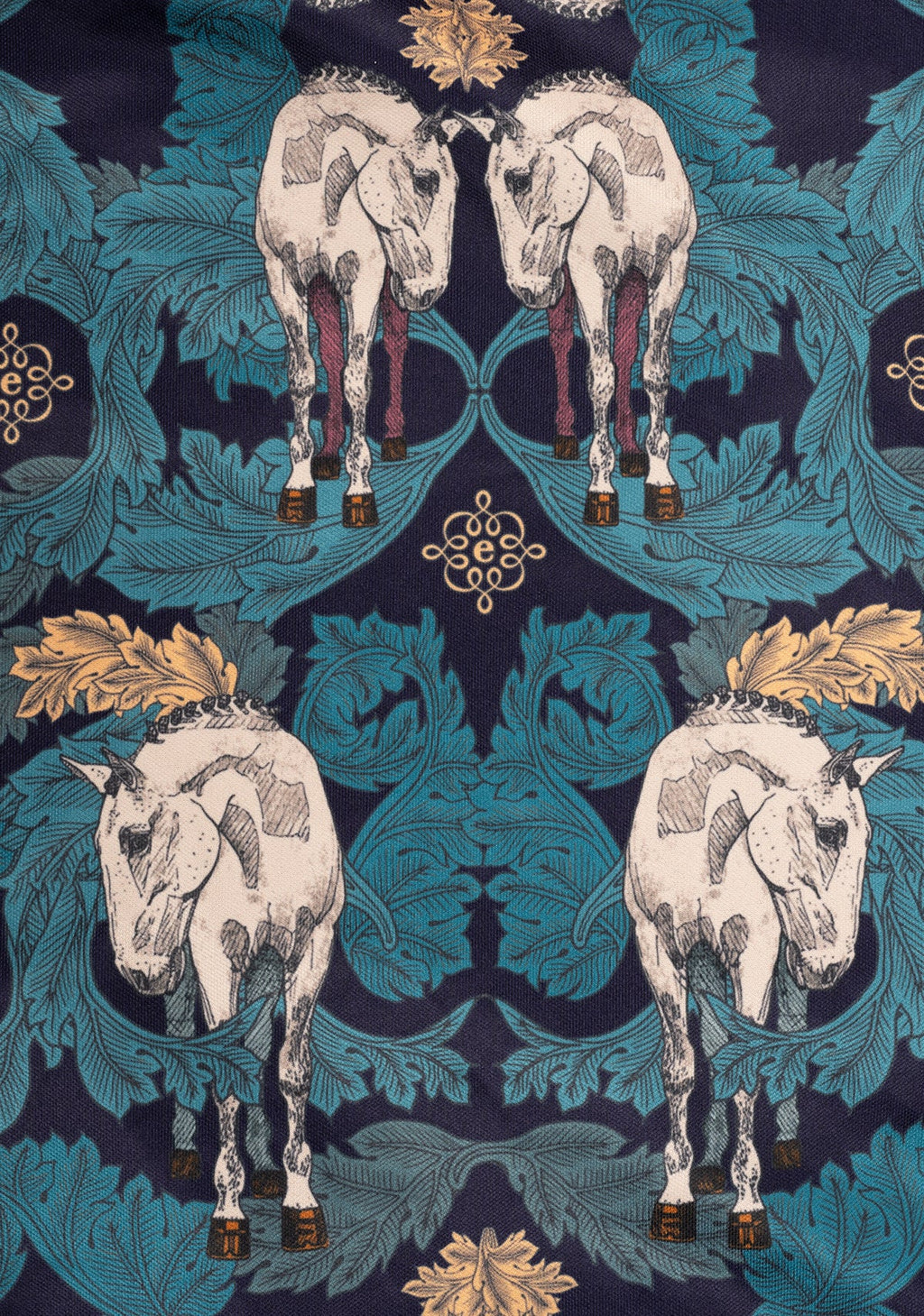Patterned fabric with horse illustrations and decorative elements on a dark blue background