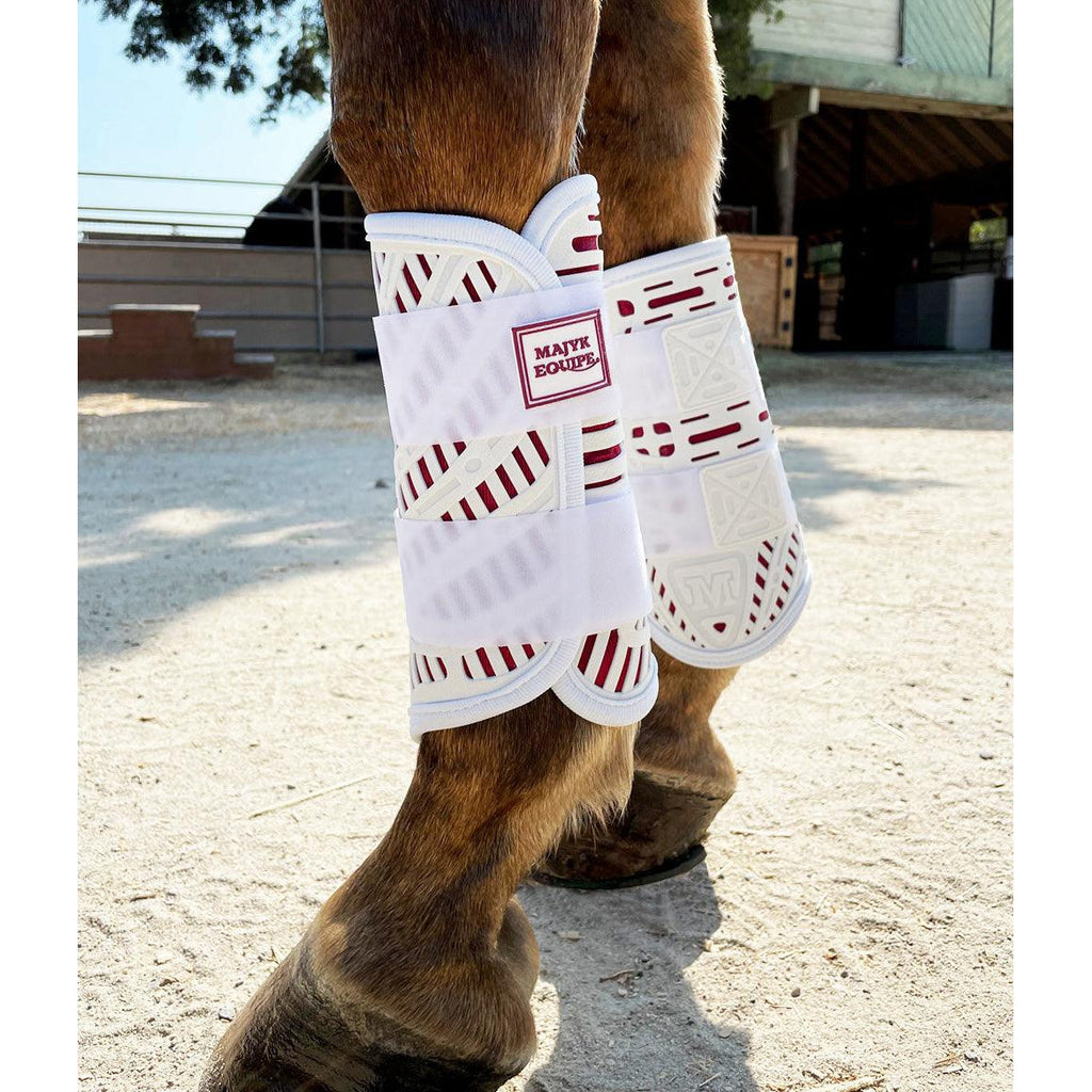 Horse leg with protective white bandage in an outdoor setting