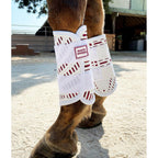 Horse leg with protective white bandage in an outdoor setting