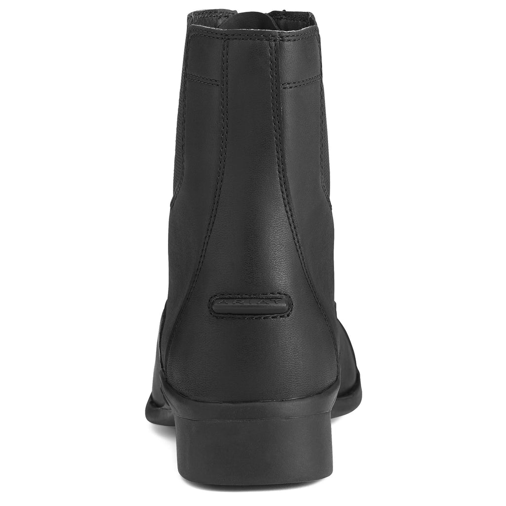 Black leather boot on a white background