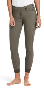 Person wearing olive green pants on a white background