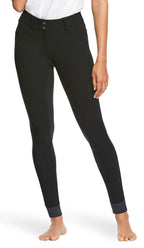 Black pants worn by a person on a white background