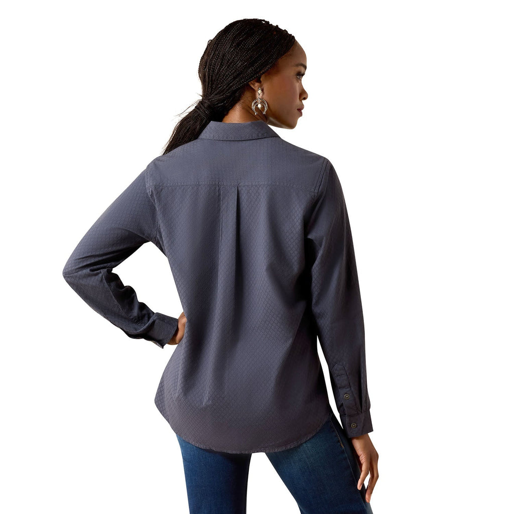 Woman wearing a gray long-sleeve shirt on a white background