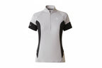 Woman wearing a gray and black cycling jersey with visible branding on a white background
