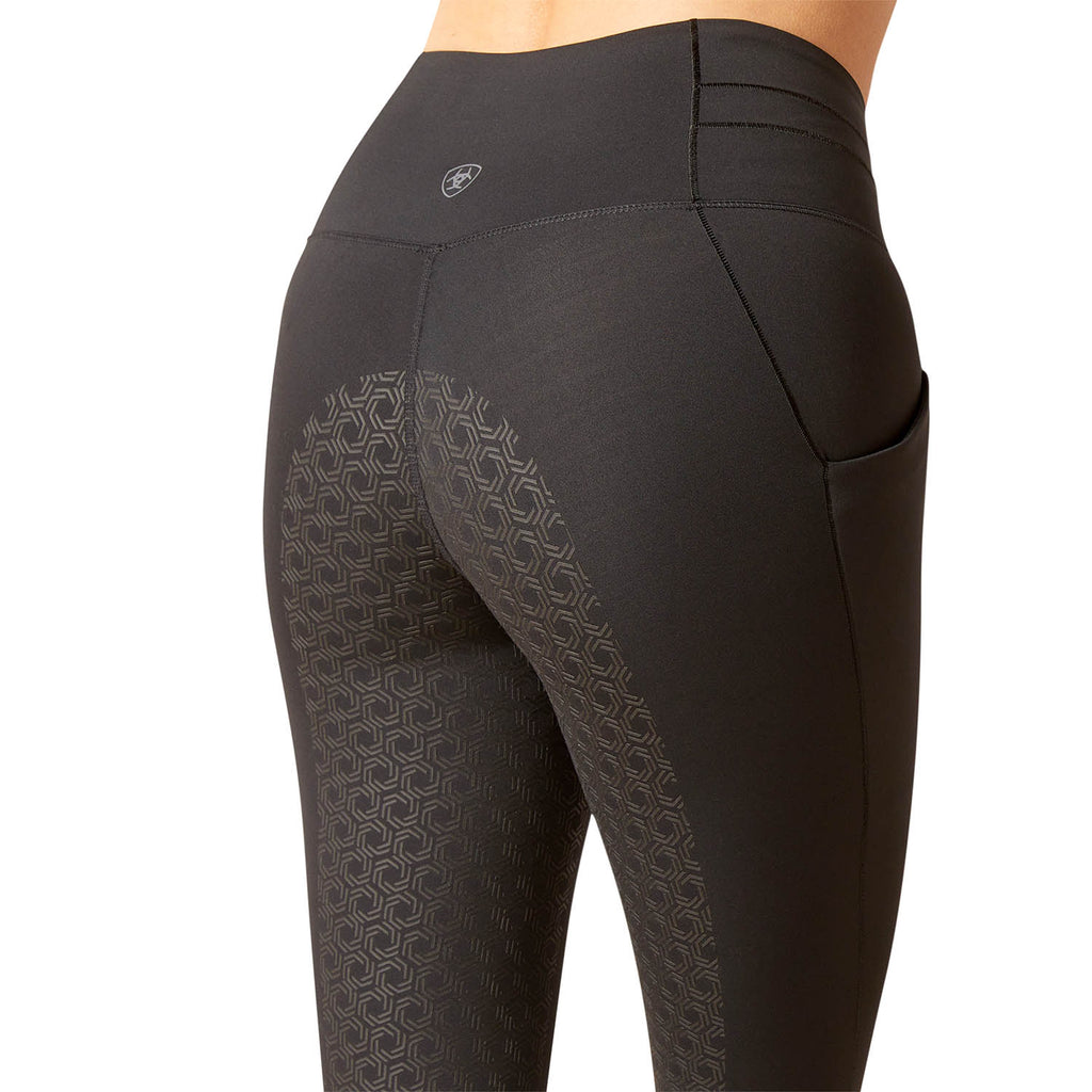 Black leggings with geometric pattern on a white background