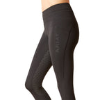 Black leggings with 'Ariat' branding on a white background