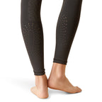 Black leggings with geometric pattern on a white background
