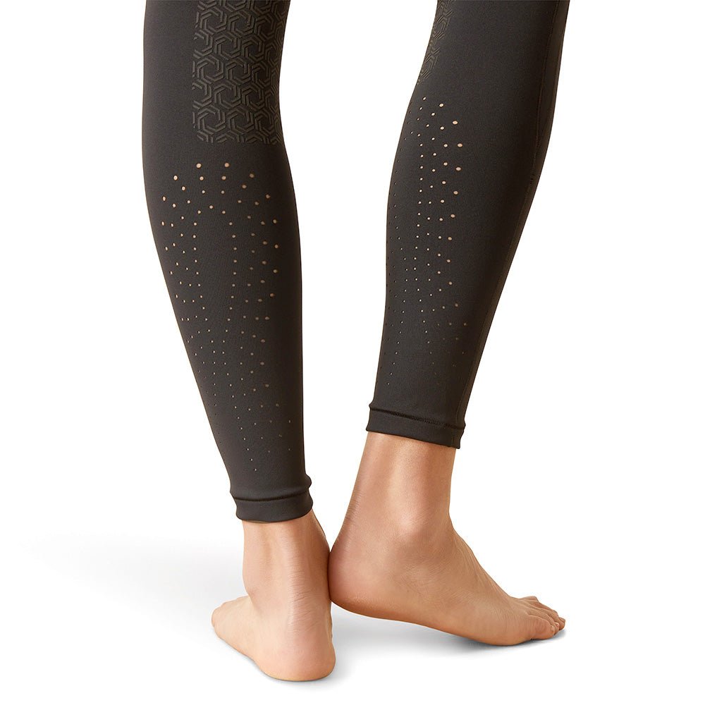 Black leggings with geometric pattern on a white background