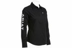Person wearing a black shirt with 'Ariat' branding on a white background