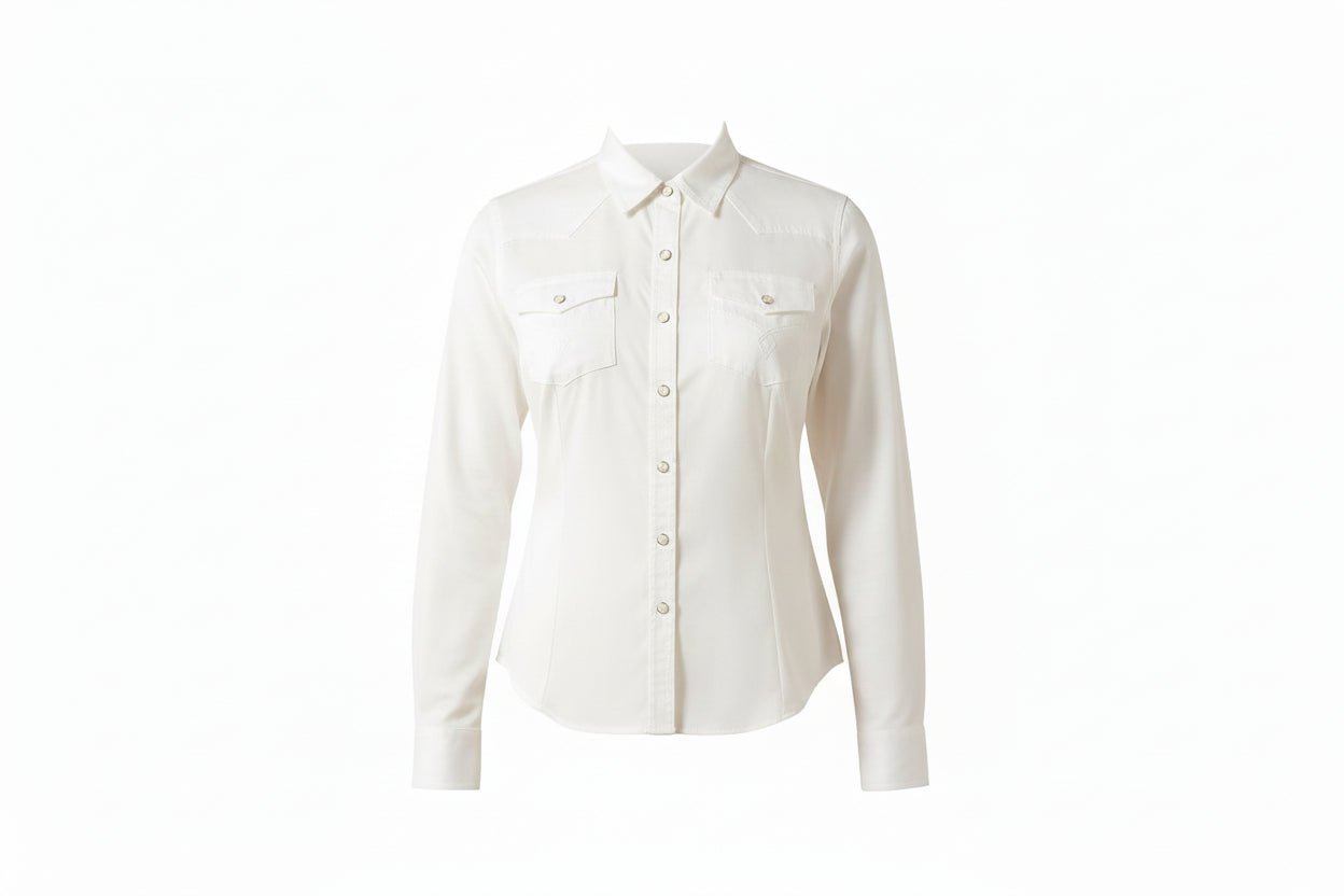 Woman wearing a white shirt with a bolo tie and dark jeans on a white background