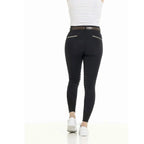 Person wearing black leggings with white accents on a white background