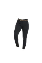 Person wearing black leggings with a belt on a white background